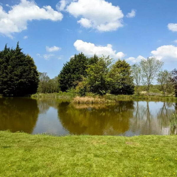 Two bedroom property with land and lake in Wales