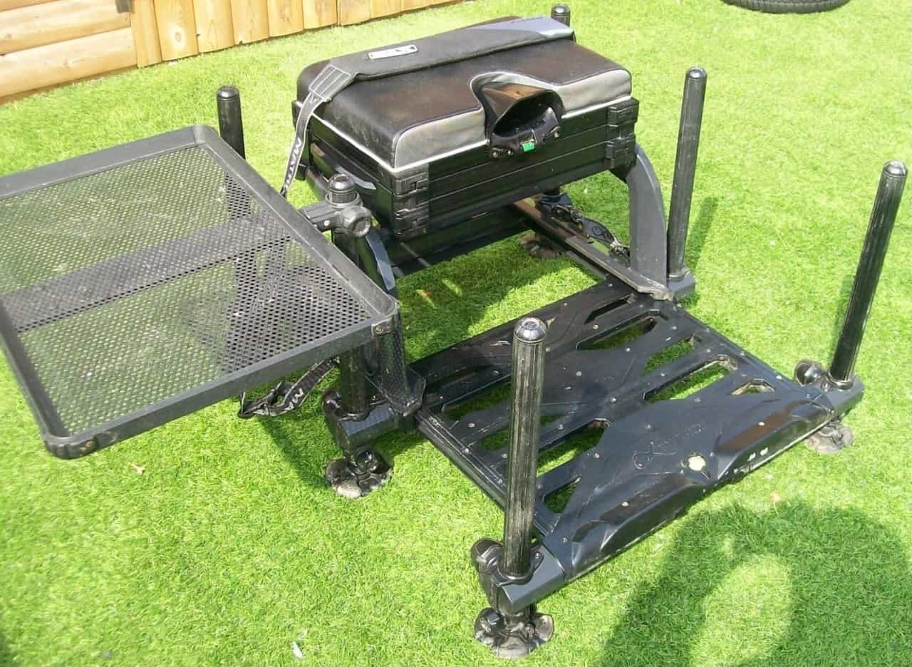 Black seat box with adjustable legs.