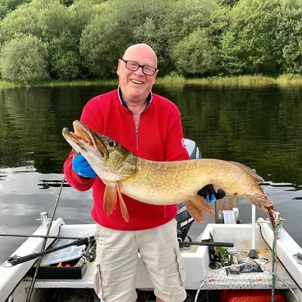 Specimen Pike being caught in Loch Awe, Dalmally