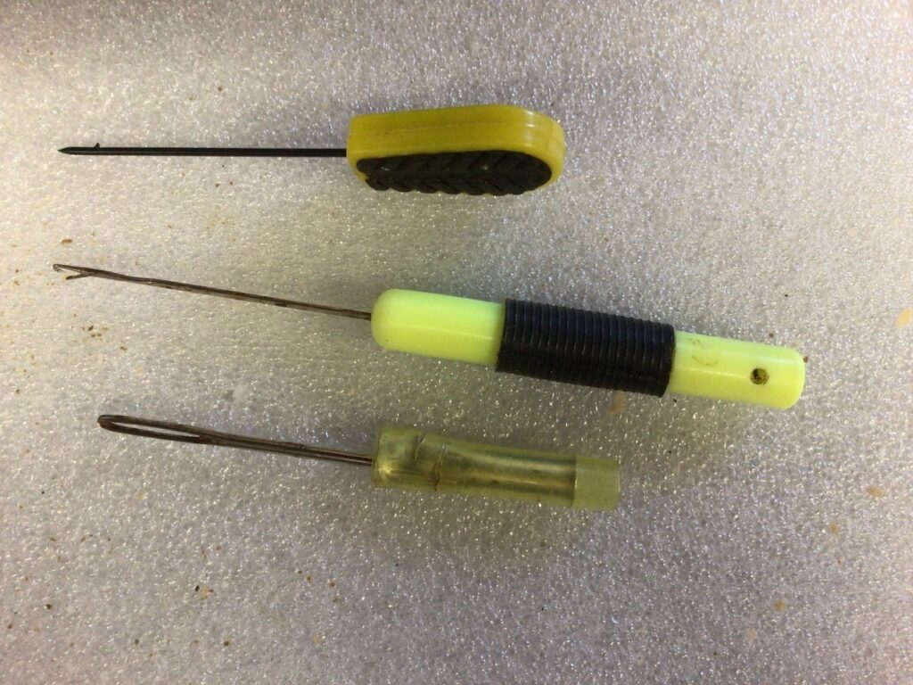 A variety of baiting needles