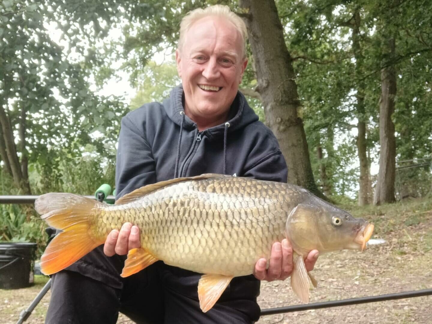 Terry with a typical common carp from big pool.