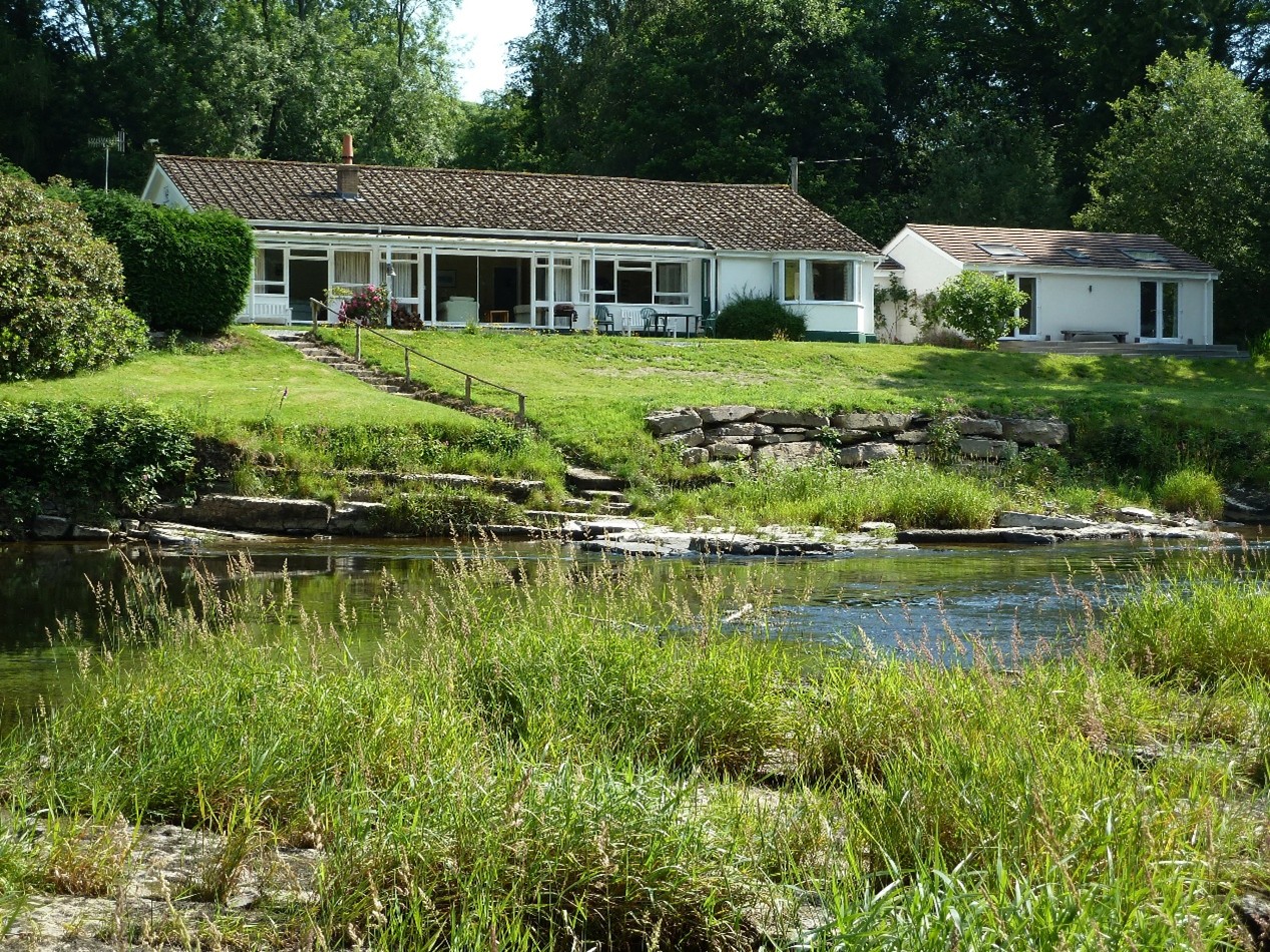 Nyth Lodge from the bank of the upper river Wye